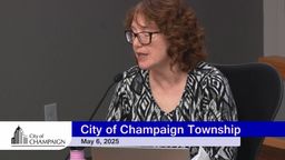 Council Member Shannon Speaking into Microphone at Dias. 